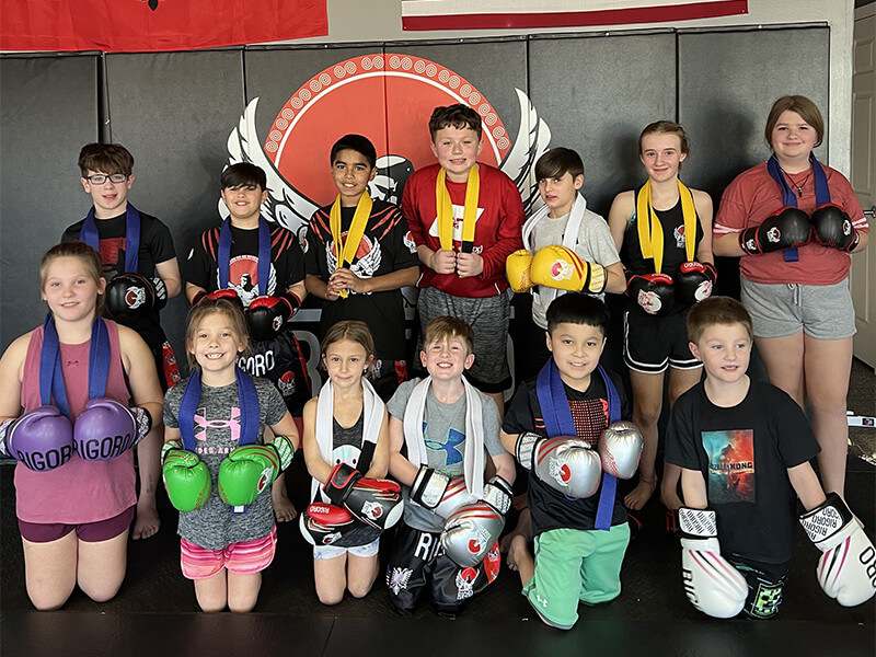 Young Rigoro kickboxing students training together