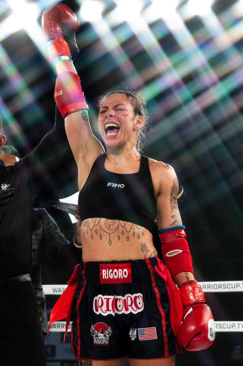 Marisol Martinez celebrating a victory in the ring